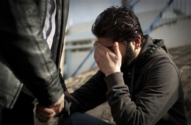 Despair in Libya A man grieves after identifying the body of his brother, killed in Benghazi (Photo: AP)