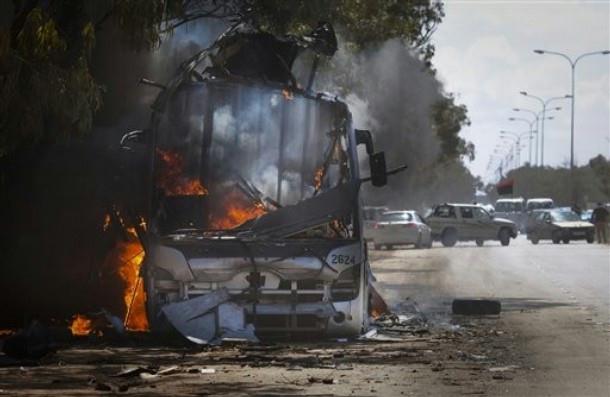 Destruction in Libya Burning bus in Libya