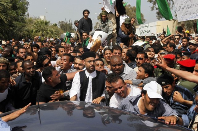 94080-libyan-leader-muammar-gaddafis-son-saif-al-islam-gaddafi-leaves-after-