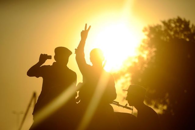 rebel-libya-compound-muammar-gaddafi-siege-tripoli-libya-10-20110824