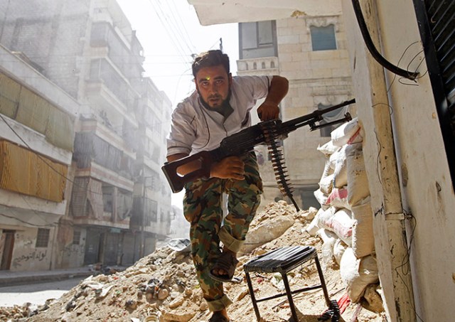 A Free Syrian Army fighter in Aleppo (Photo: Goran Tomasevic / Reuters)
