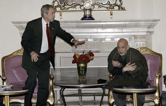 Afghan President Karzai with former US President George Bush. (Photo: Musadeq Sadeq / AFP / Getty Images)