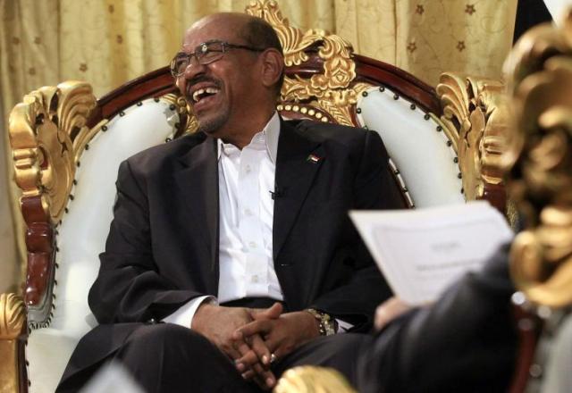 Omar al-Bashir, indicted by the ICC on charges of war crimes, crimes against humanity, and genocide, seems mostly unconcerned about the Court's arrest warrant against him. (Photo:  Mohamed Nureldin Abdallah / Reuters) 