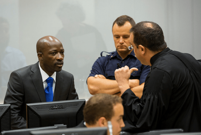 Charles Blé Goudé consults his defence counsel at the International Criminal Court (Photo: ICC)