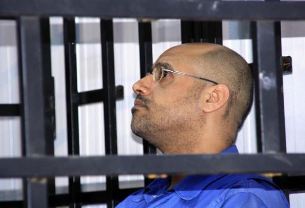 Saif al-Islam Gaddafi, attends a trial hearing in a courtroom in Zintan in May 2014 (Photo: Reuters / Stringer)